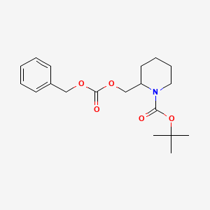 molecular formula C19H27NO5 B3099460 2-Benzyloxycarbonyloxymethyl-piperidine-1-carboxylic acid tert-butyl ester CAS No. 1353980-12-7