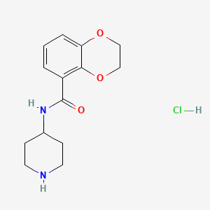 molecular formula C14H19ClN2O3 B3099464 N-(Piperidin-4-yl)-2,3-dihydrobenzo[b][1,4]dioxine-5-carboxamide hydrochloride CAS No. 1353980-67-2