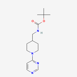 molecular formula C15H24N4O2 B3100237 叔丁基 N-[1-(嘧啶-4-基)哌啶-4-基]甲基氨基甲酸酯 CAS No. 1365988-01-7