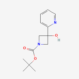 molecular formula C13H18N2O3 B3102140 叔丁基3-羟基-3-(吡啶-2-基)氮杂环丁烷-1-羧酸酯 CAS No. 1415560-24-5