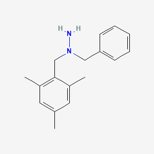 molecular formula C17H22N2 B3103240 1-Benzyl-1-(mesitylmethyl)hydrazine CAS No. 143425-79-0