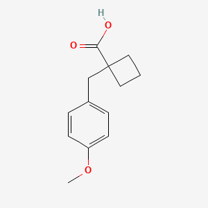 molecular formula C13H16O3 B3103451 1-(4-Methoxybenzyl)cyclobutanecarboxylic acid CAS No. 1439903-09-9
