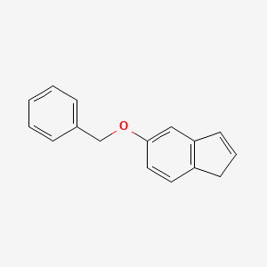 molecular formula C16H14O B3103612 5-(Benzyloxy)-1H-indene CAS No. 1446091-32-2