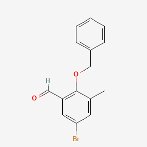 molecular formula C15H13BrO2 B3106105 2-(Benzyloxy)-5-bromo-3-methylbenzaldehyde CAS No. 1566412-28-9
