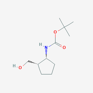 molecular formula C11H21NO3 B3106616 叔丁基 N-[(1R,2S)-2-(羟甲基)环戊基]氨基甲酸酯 CAS No. 1598415-47-4