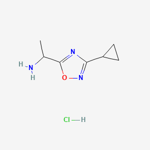 molecular formula C7H12ClN3O B3107255 [1-(3-环丙基-1,2,4-恶二唑-5-基)乙基]胺盐酸盐 CAS No. 1609406-70-3