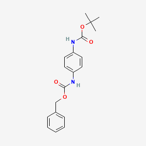 molecular formula C19H22N2O4 B3117025 Benzyl N-(4-{[(tert-butoxy)carbonyl]amino}phenyl)carbamate CAS No. 220741-56-0