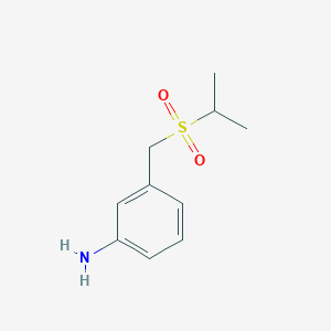 molecular formula C10H15NO2S B3123491 3-[(Propane-2-sulfonyl)methyl]aniline CAS No. 307989-68-0