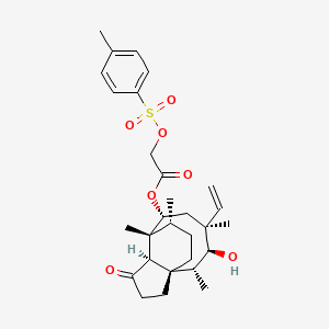 [(1S,2R,3S,4S,6R,7R,8R,14R)-4-Ethenyl-3-hydroxy-2,4,7,14-tetramethyl-9-oxo-6-tricyclo[5.4.3.01,8]tetradecanyl] 2-(4-methylphenyl)sulfonyloxyacetate