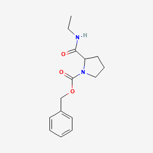 molecular formula C15H20N2O3 B3130113 2-(乙基氨基甲酰基)吡咯烷-1-羧酸苄酯 CAS No. 340703-57-3