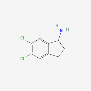 molecular formula C9H9Cl2N B3149377 5,6-Dichloro-indan-1-ylamine CAS No. 67120-42-7