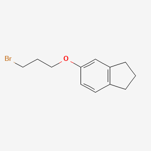 molecular formula C12H15BrO B3154653 1H-Indene, 5-(3-bromopropoxy)-2,3-dihydro- CAS No. 78114-95-1