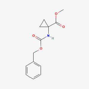 molecular formula C13H15NO4 B3157164 Methyl 1-{[(benzyloxy)carbonyl]amino}cyclopropane-1-carboxylate CAS No. 84677-05-4
