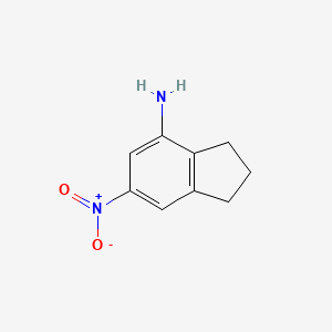 molecular formula C9H10N2O2 B3158989 6-nitro-2,3-dihydro-1H-inden-4-amine CAS No. 860722-19-6