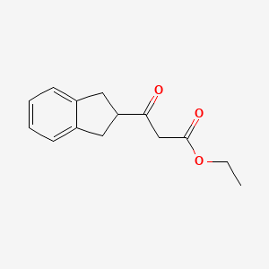 molecular formula C14H16O3 B3164224 ethyl 3-(2,3-dihydro-1H-inden-2-yl)-3-oxopropanoate CAS No. 889957-62-4