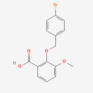 molecular formula C15H13BrO4 B3169911 2-[(4-Bromobenzyl)oxy]-3-methoxybenzoic acid CAS No. 938330-03-1