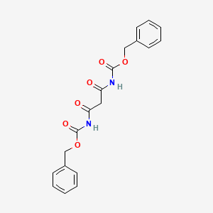 molecular formula C19H18N2O6 B3170350 benzyl N-[3-(benzyloxycarbonylamino)-3-oxo-propanoyl]carbamate CAS No. 94254-56-5