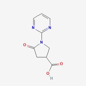 molecular formula C9H9N3O3 B3170544 5-氧代-1-嘧啶-2-基吡咯烷-3-羧酸 CAS No. 944648-75-3