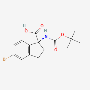 molecular formula C15H18BrNO4 B3180591 (R)-5-Bromo-1-((tert-butoxycarbonyl)amino)-2,3-dihydro-1H-indene-1-carboxylic acid CAS No. 2089671-94-1