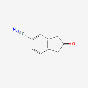 molecular formula C10H7NO B3185664 2-Oxo-2,3-dihydro-1h-indene-5-carbonitrile CAS No. 1187983-93-2