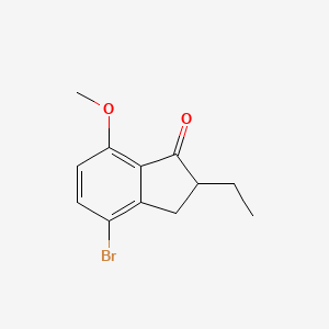 B3187843 4-Bromo-2-ethyl-7-methoxy-2,3-dihydro-1H-inden-1-one CAS No. 177362-58-2