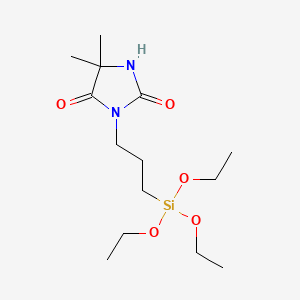 molecular formula C14H28N2O5Si B3190754 2,4-Imidazolidinedione, 5,5-dimethyl-3-[3-(triethoxysilyl)propyl]- CAS No. 473780-80-2
