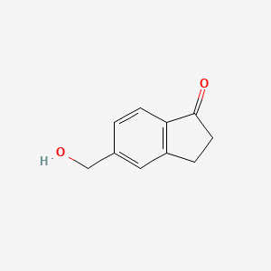 molecular formula C10H10O2 B3193844 5-(Hydroxymethyl)-2,3-dihydro-1H-inden-1-one CAS No. 760995-53-7