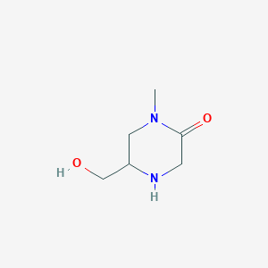 molecular formula C6H12N2O2 B3196663 5-(Hydroxymethyl)-1-methylpiperazin-2-one CAS No. 1000577-51-4