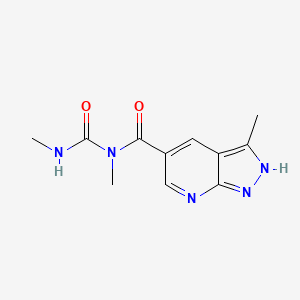 molecular formula C11H13N5O2 B3196730 1,3-dimethyl-1-{3-methyl-1H-pyrazolo[3,4-b]pyridine-5-carbonyl}urea CAS No. 1000929-95-2
