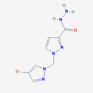 molecular formula C8H9BrN6O B3197022 1-((4-Bromo-1H-pyrazol-1-yl)methyl)-1H-pyrazole-3-carbohydrazide CAS No. 1002243-76-6