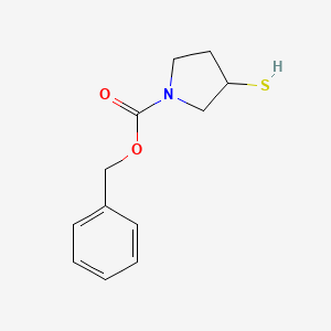 molecular formula C12H15NO2S B3197342 3-Mercapto-pyrrolidine-1-carboxylic acid benzyl ester CAS No. 100472-48-8
