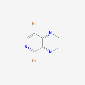 molecular formula C7H3Br2N3 B3197802 5,8-Dibromopyrido[3,4-b]pyrazine CAS No. 1007128-70-2