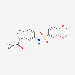 molecular formula C20H20N2O5S B3197984 N-[1-(cyclopropylcarbonyl)-2,3-dihydro-1H-indol-6-yl]-2,3-dihydro-1,4-benzodioxine-6-sulfonamide CAS No. 1007699-90-2