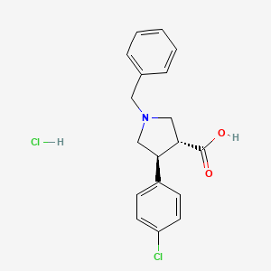 molecular formula C18H19Cl2NO2 B3198404 trans-1-Benzyl-4-(4-chlorophenyl)pyrrolidine-3-carboxylic acid hydrochloride CAS No. 1013117-42-4