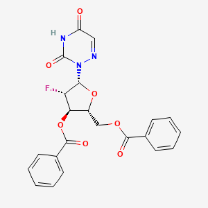 molecular formula C22H18FN3O7 B3198424 [(2R,3R,4S,5R)-3-Benzoyloxy-5-(3,5-dioxo-1,2,4-triazin-2-yl)-4-fluorooxolan-2-yl]methyl benzoate CAS No. 1013470-68-2