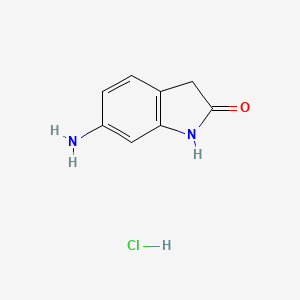 molecular formula C8H9ClN2O B3198448 6-Amino-1,3-dihydro-2H-indol-2-one hydrochloride CAS No. 101389-22-4