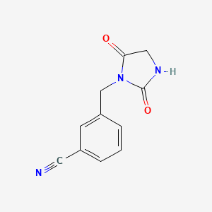 molecular formula C11H9N3O2 B3198957 3-[(2,5-Dioxoimidazolidin-1-yl)methyl]benzonitrile CAS No. 1016720-67-4