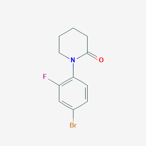 molecular formula C11H11BrFNO B3199135 1-(4-Bromo-2-fluorophenyl)piperidin-2-one CAS No. 1016773-90-2