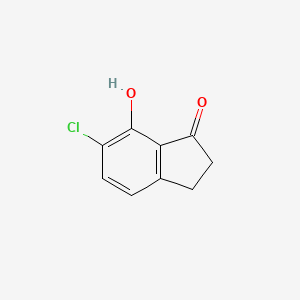 molecular formula C9H7ClO2 B3200548 1H-Inden-1-one, 6-chloro-2,3-dihydro-7-hydroxy- CAS No. 101819-36-7
