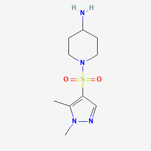 molecular formula C10H18N4O2S B3200663 1-[(1,5-dimethyl-1H-pyrazol-4-yl)sulfonyl]piperidin-4-amine CAS No. 1018996-02-5