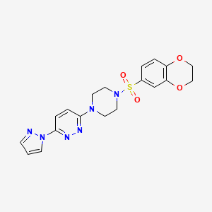 molecular formula C19H20N6O4S B3201355 3-(4-((2,3-dihydrobenzo[b][1,4]dioxin-6-yl)sulfonyl)piperazin-1-yl)-6-(1H-pyrazol-1-yl)pyridazine CAS No. 1019103-72-0
