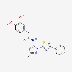 molecular formula C23H22N4O3S B3201868 2-(3,4-dimethoxyphenyl)-N-(3-methyl-1-(4-phenylthiazol-2-yl)-1H-pyrazol-5-yl)acetamide CAS No. 1020489-04-6