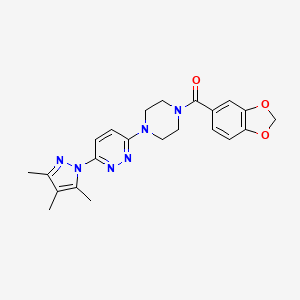 molecular formula C22H24N6O3 B3201992 benzo[d][1,3]dioxol-5-yl(4-(6-(3,4,5-trimethyl-1H-pyrazol-1-yl)pyridazin-3-yl)piperazin-1-yl)methanone CAS No. 1020502-57-1