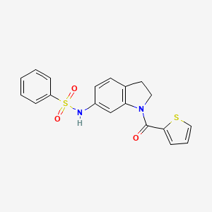 molecular formula C19H16N2O3S2 B3202344 N-(1-(thiophene-2-carbonyl)indolin-6-yl)benzenesulfonamide CAS No. 1021208-43-4