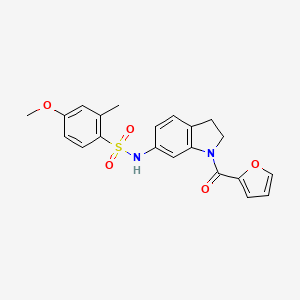 molecular formula C21H20N2O5S B3202400 N-(1-(furan-2-carbonyl)indolin-6-yl)-4-methoxy-2-methylbenzenesulfonamide CAS No. 1021208-97-8