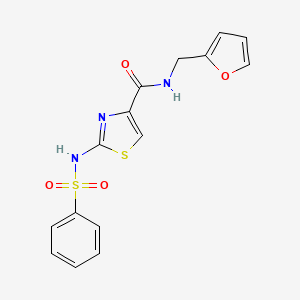 molecular formula C15H13N3O4S2 B3202658 N-(furan-2-ylmethyl)-2-(phenylsulfonamido)thiazole-4-carboxamide CAS No. 1021212-80-5
