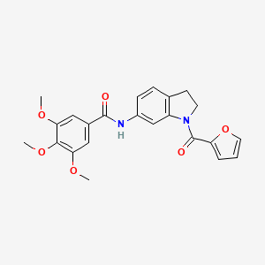 molecular formula C23H22N2O6 B3202921 N-(1-(furan-2-carbonyl)indolin-6-yl)-3,4,5-trimethoxybenzamide CAS No. 1021221-40-8
