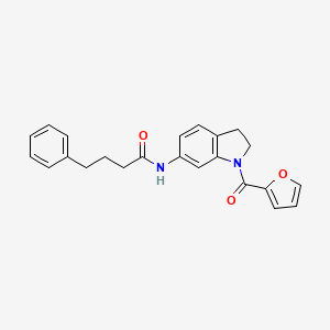 molecular formula C23H22N2O3 B3202929 N-(1-(furan-2-carbonyl)indolin-6-yl)-4-phenylbutanamide CAS No. 1021221-49-7