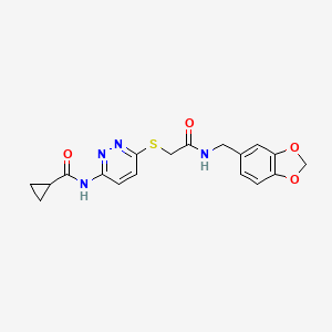 molecular formula C18H18N4O4S B3203375 N-(6-((2-((benzo[d][1,3]dioxol-5-ylmethyl)amino)-2-oxoethyl)thio)pyridazin-3-yl)cyclopropanecarboxamide CAS No. 1021254-62-5