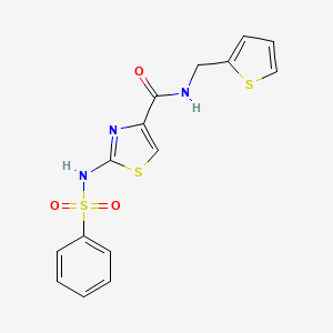 molecular formula C15H13N3O3S3 B3203504 2-(phenylsulfonamido)-N-(thiophen-2-ylmethyl)thiazole-4-carboxamide CAS No. 1021259-49-3